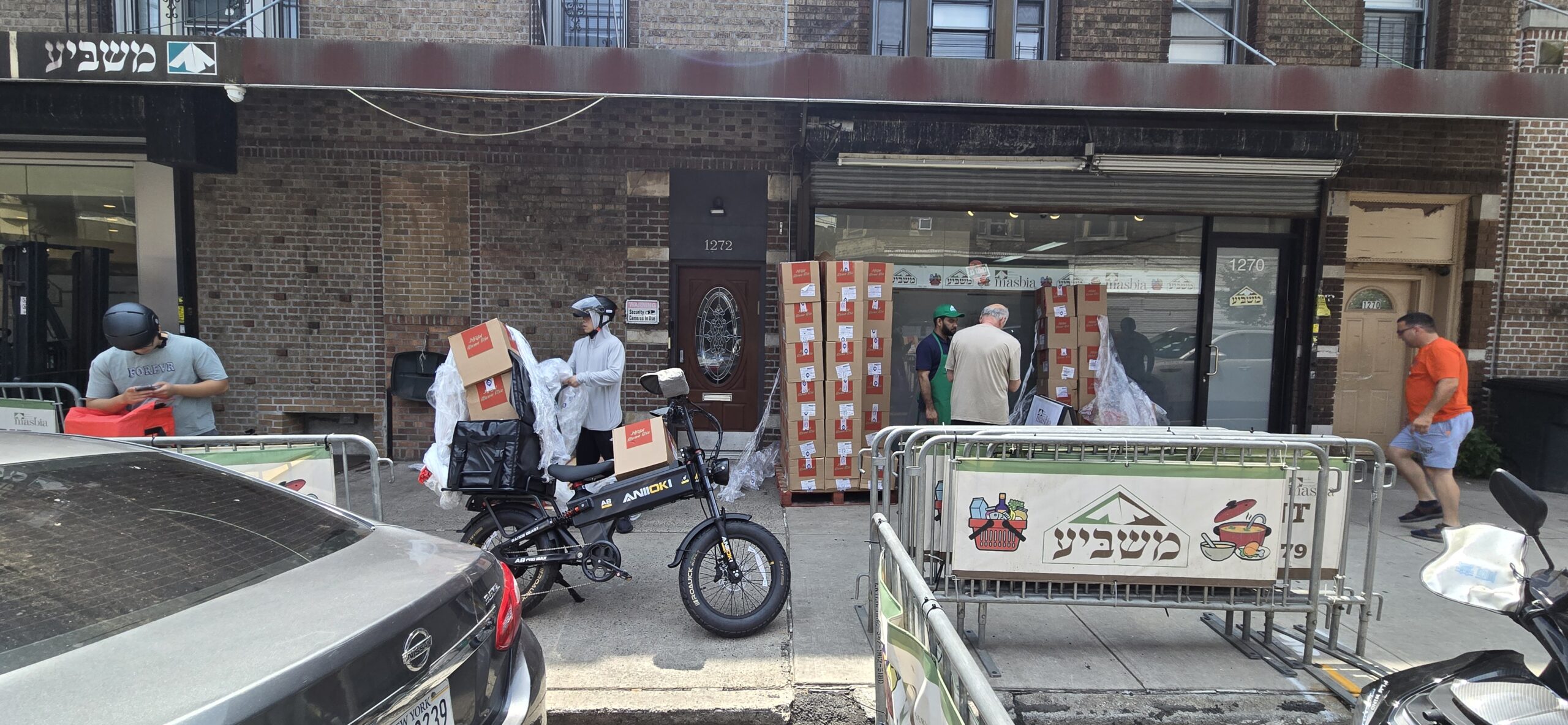 Masbia Distributes 3,000 Pounds of Frozen Pizza to Local Families, Reported in The Boro Park View by Sandy Eller